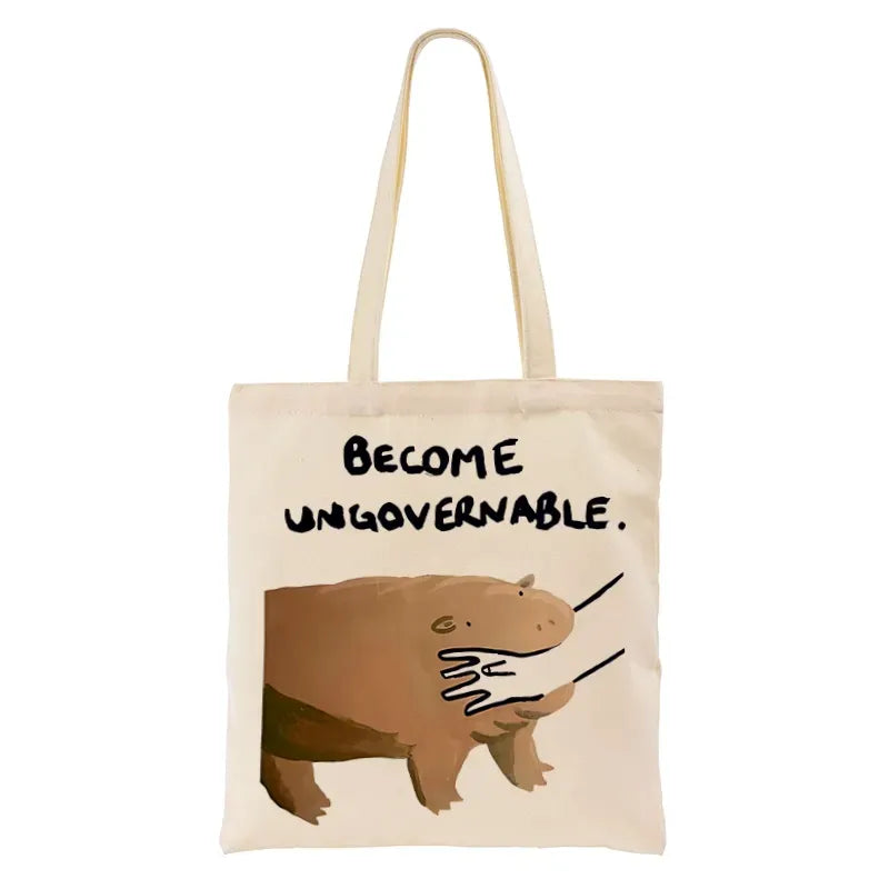 Kyoto-Lion Moo Deng Bites Someone's Arm Tote Bag