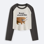 Kyoto-Lion Moo Deng Bites Someone's Arm Women's Crop Raglan T-Shirt
