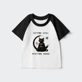 Kyoto-Lion Sitting still plotting chaos Calming Zen Cat Funny Kids Raglan T-shirt