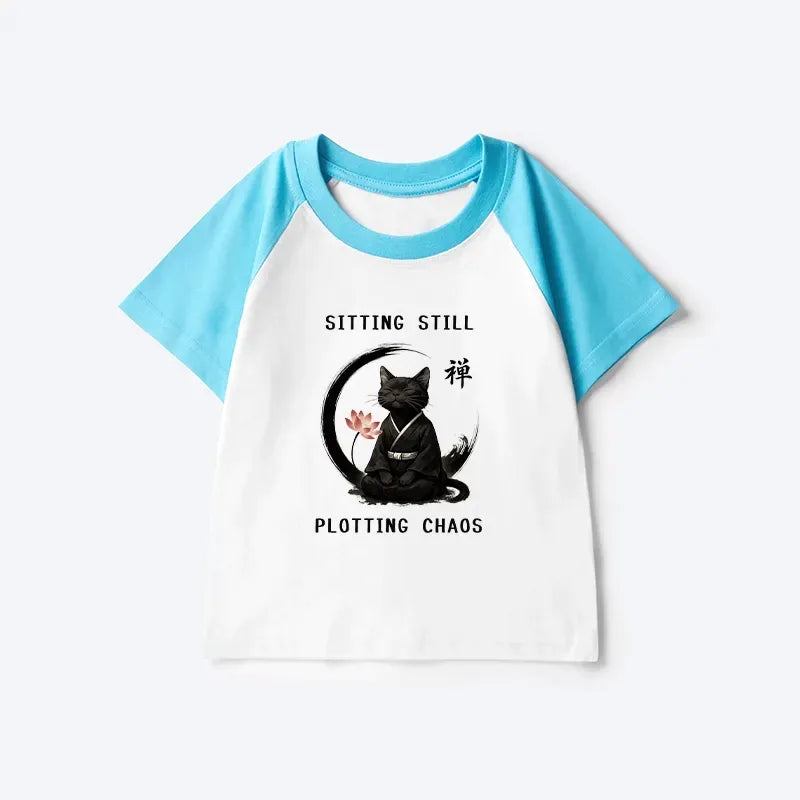 Kyoto-Lion Sitting still plotting chaos Calming Zen Cat Funny Kids Raglan T-shirt